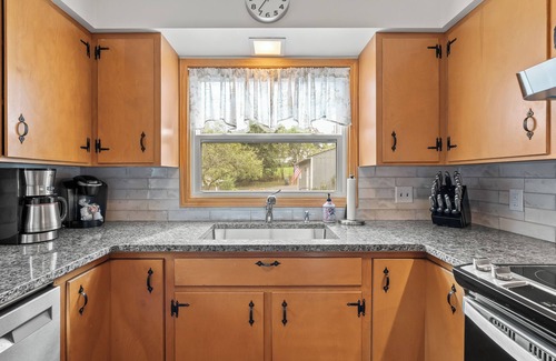 Kendall Cottage | Cozy Spotless Lake Cottage- Flowers Galore, Sandy Beach, Gorgeous Sunsets