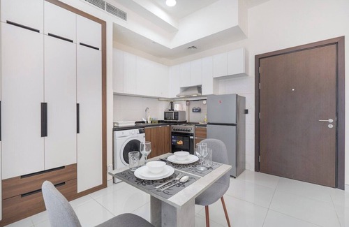 International City Apartment | Cozy Studio Apartment with Pool View in International City