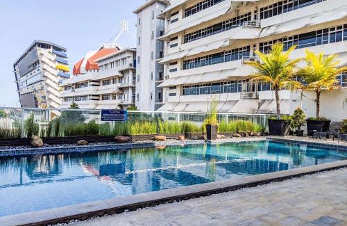 Siwalankerto Apartment | Cozy Studio The Square Surabaya Apartment By Travelio