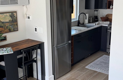 Helena West Side Apartment | Cozy studio with modern kitchen in unit laundry and AC close to hiking trails.