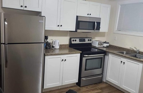 Regina Apartment | Cozy & Stylish One Bedroom Suite @ Harbor Landing