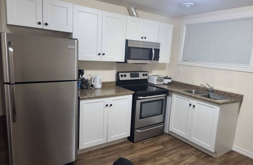 Regina Apartment | Cozy & Stylish One Bedroom Suite @ Harbor Landing