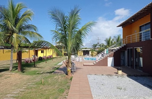 Barra Nova Villa | Cozy suite with a view of the space, air conditioning, minibar and smart TV