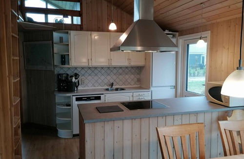 Diernæs House | Cozy summer house by the beach and forest.