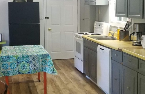 Novar Cottage | Cozy Sunset Cabin located lakeside in family friendly campground