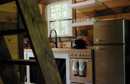 Lawrence County Cabin | Cozy Tiny Home in the woods of Middle Tennessee with AC and high speed internet