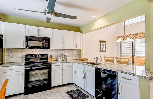 Sea Pines House | Cozy townhome with access to multiple shared amenities, bike paths, shopping