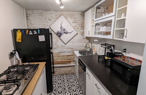 Mahncke Park House | Cozy townhome with 4 beds for 5 guests, full bath, kitchen, living room & patio!