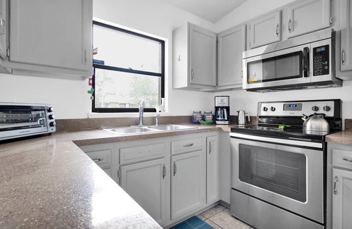 Southside House | Cozy townhouse, centrally located with garage and fenced yard.