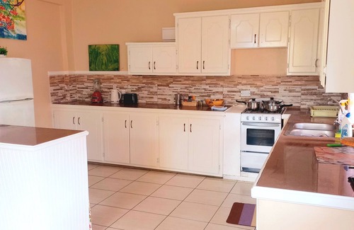 Soufriere House | Cozy Tropical Vacation home 10 minutes away from beaches and attractions