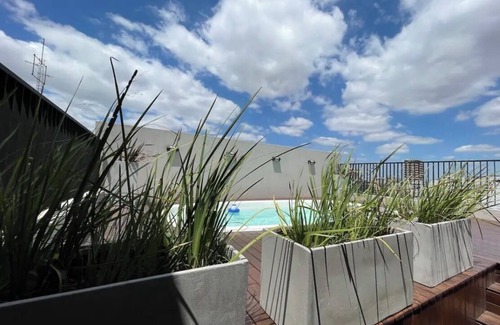 Comuna 7 Apartment | Cozy two-bedroom apartment, excellent location, 24-hour security, pool barbecue.