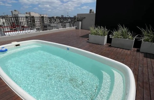 Comuna 7 Apartment | Cozy two-bedroom apartment, excellent location, 24-hour security, pool barbecue.