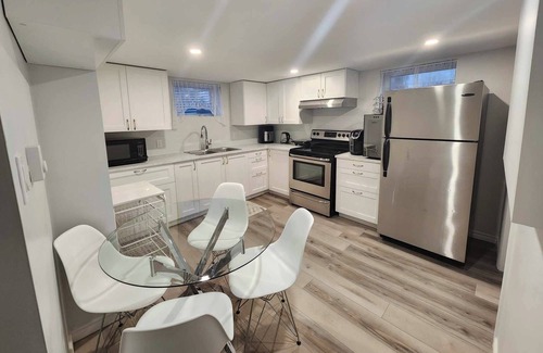 Dieppe Apartment | Cozy Two Bedroom Lower Level Apartment - Walking Distance To Most Places & Trail