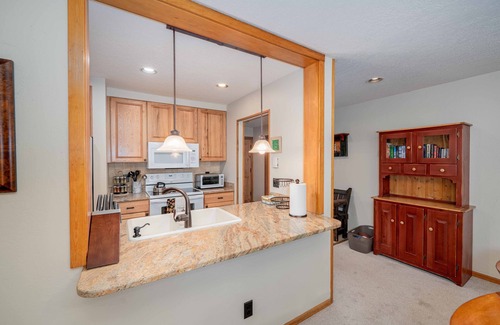 Lakeside Village Condo | Cozy, updated condo with lake views and ski shuttle right out front!