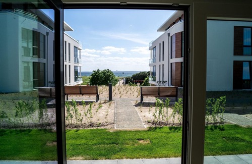 Pelzerhaken Apartment | Cozy vacation apartment with sea view & terrace at Südkap A-03 in Pelzerhaken