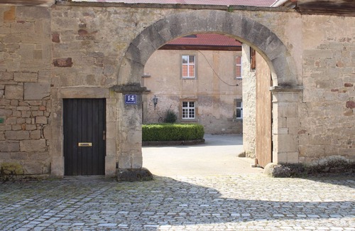 Bastheim Apartment | Cozy vacation apartment with view of the monastery mill (50sqm)