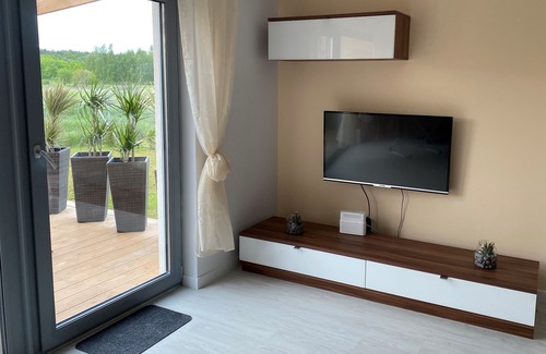 Trzesacz House | Cozy vacation home 600 m from the Baltic Sea with fireplace and sauna
