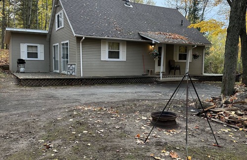 Lakewood House | Cozy vacation home nestled in a quiet wooded area. Near town but private