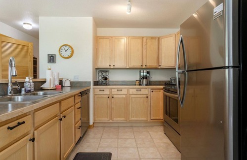 Wildernest Condo | Cozy Watch Hill Lodge: Stunning Mountain Views, Shared Hot Tub, and Convenient Ski Resort Access!