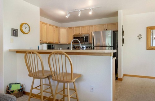 Wildernest Condo | Cozy Watch Hill Lodge: Stunning Mountain Views, Shared Hot Tub, and Convenient Ski Resort Access!
