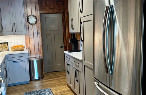 Newaygo Cottage | Cozy Waterfront Cottage - 2 private docks, kayaks, pedal boat, grill & firepit!