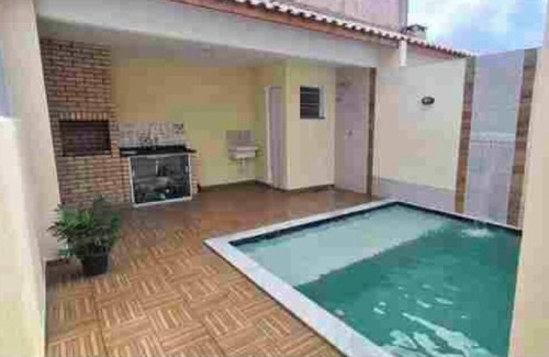 Itanhaem House | Cozy with a pool and beach just around the corner.