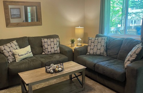 Higgins Lake House | Cozy wooded cabin. Only two minute walk to Higgins lake!