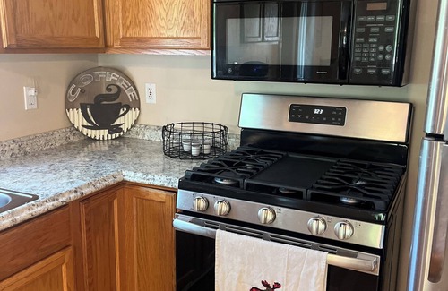 Higgins Lake House | Cozy wooded cabin. Only two minute walk to Higgins lake!