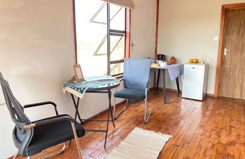 Palapye Cabin | Cozy wooden cabin overlooking the foot of the Tswapong Hills in Palapye.