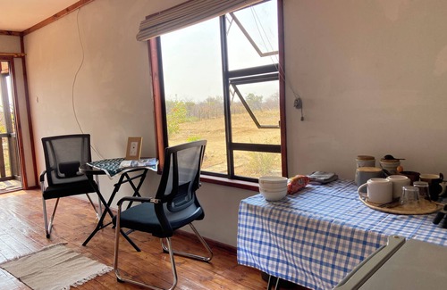 Palapye Cabin | Cozy wooden cabin overlooking the foot of the Tswapong Hills in Palapye.