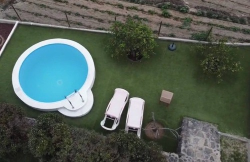 Guimar House | Cozy wooden house with pool