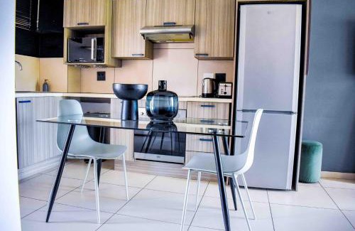 Boksburg Apartment | CozyHome Near Airport with pool gym and 24hour security