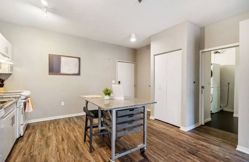 Mill District Apartment | CozySuites Mill District with pool, gym #02
