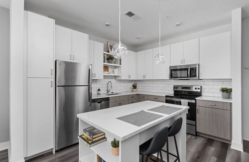 Cole-Noble District Apartment | CozySuites Spacious 1BR Near Whole Foods