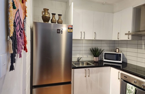 Wellington Apartment | CQN's - A perfect blend of modern comfort and timeless appeal.