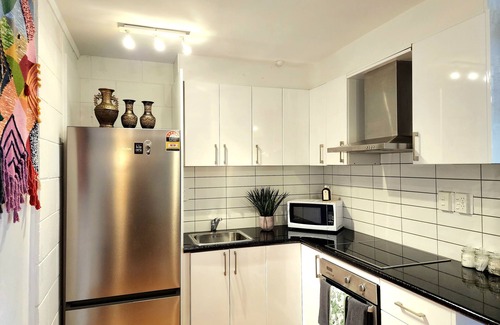 Wellington Apartment | CQN's - A perfect blend of modern comfort and timeless appeal.