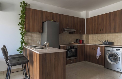 Livadia Apartment | Creative 1BR Pool View Apt with Covered Parking