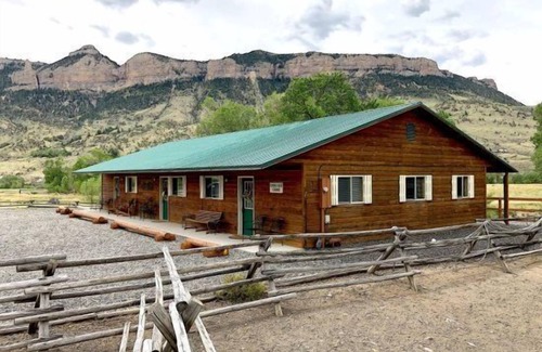 Cody Apartment | Creek Side Cabin #1 in the Wapiti Valley and steps from Trout Creek