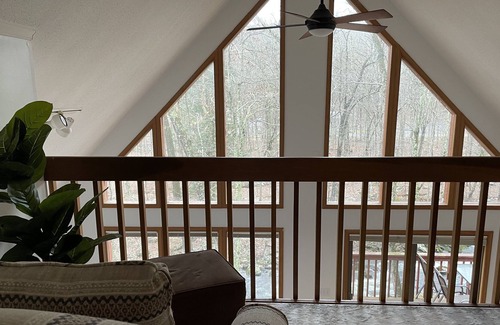 Bushkill Ski Chalet | Creek-side chalet with hot tub and fireplace