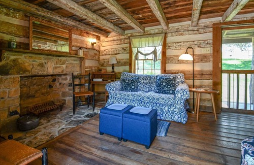 Raphine Cabin | Creekside historic log cabin with all modern amenities at historic Wade's Mill