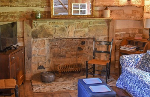 Raphine Cabin | Creekside historic log cabin with all modern amenities at historic Wade's Mill