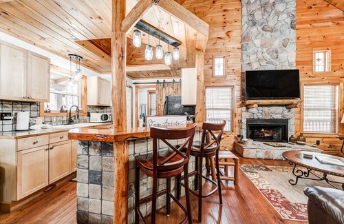 Helen Cabin | Creekside home on wooded acreage with WiFi, hot tub, fireplace, & pool table