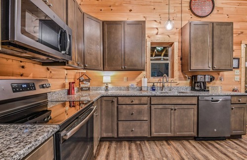 Sevierville Cabin | Creekside on the Bluff: Pet Friendly, Free Attraction Tickets, & Creek View