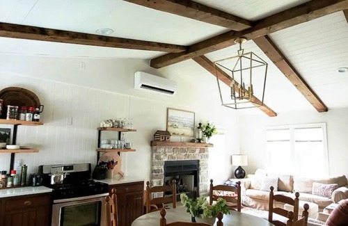 Bedford Cottage | Creekside With Hot Tub, Gas Fireplace, Fishing, Minutes to Downtown and Omni Spa