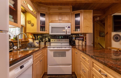 Elk Park House | Creeksong Cabin - log home with fire pit, large creek on property