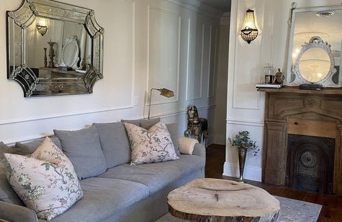 French Quarter Apartment | Creole Chic in the French Quarter with Lush Courtyard