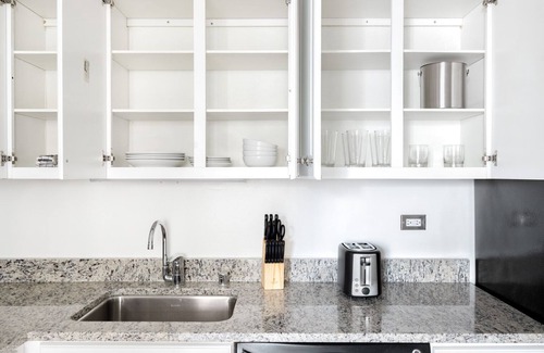 Rush and Division Apartment | Crisp River North 1BR w/Gym, Pool, nr. Oak Street Beach, by Blueground