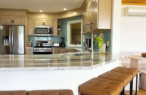 Lake Township House | Crystal Lake Hillside with Private Sandy Beach and Hot Tub!