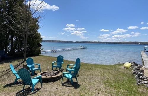Lake Township House | Crystal Lake Waterfront Cottage with Private Dock, Yard, & Hot Tub