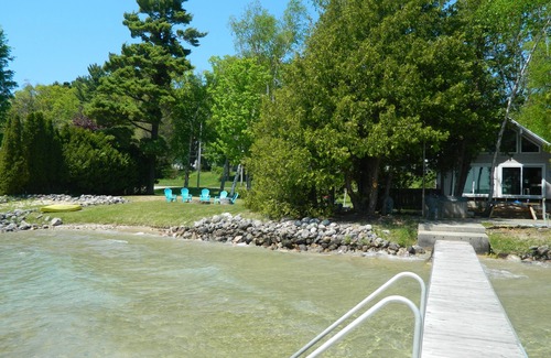 Lake Township House | Crystal Lake Waterfront Cottage with Private Dock, Yard, & Hot Tub